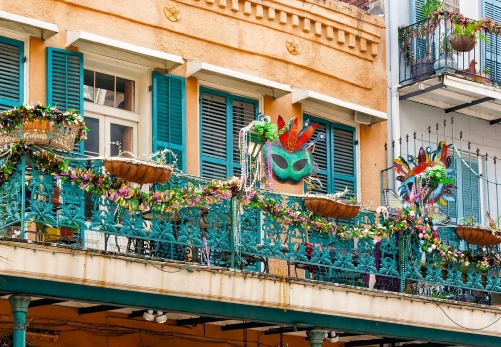 balconies in New Orleans decorated for Mardi Gras